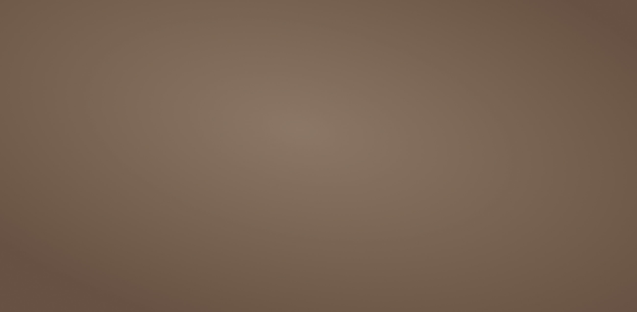Brown textured background with subtle variations.